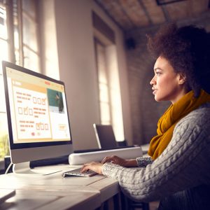woman taking test on computer